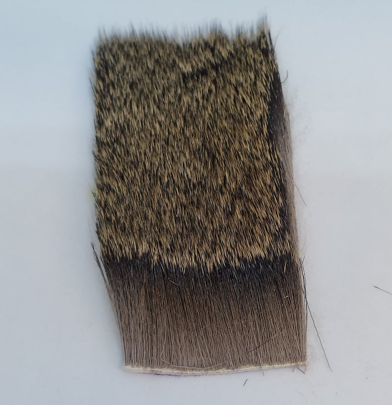 Deer hair X-caddis fly tying material, dark mottled hair patch