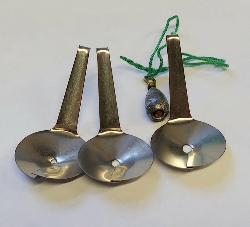 Metal hatch hackle guard with three brass-toned shield blades and green tie cord