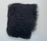 Black wool tuft with dense shag fibers