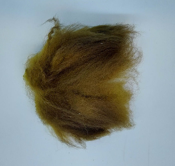 Olive wool tuft with dense shag fibers