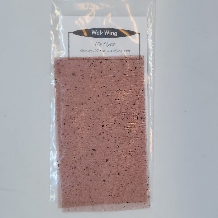 Mottled brown web wing sheet in a plastic sleeve
