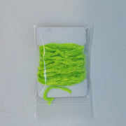 Chenille yarn bundle in chartreuse green, tightly looped in clear packaging