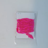 a package of bright pink chenille