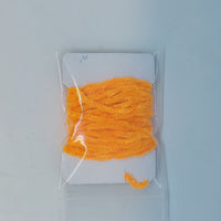 a package of bright orange chenille