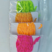 Chenille yarn bundle in lime green, orange, and hot pink, loosely looped in packaging