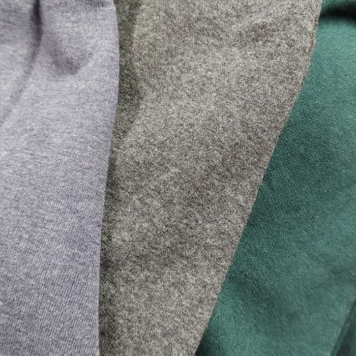 Hoodie sweatshirt fabric close-up with heather gray and green panel