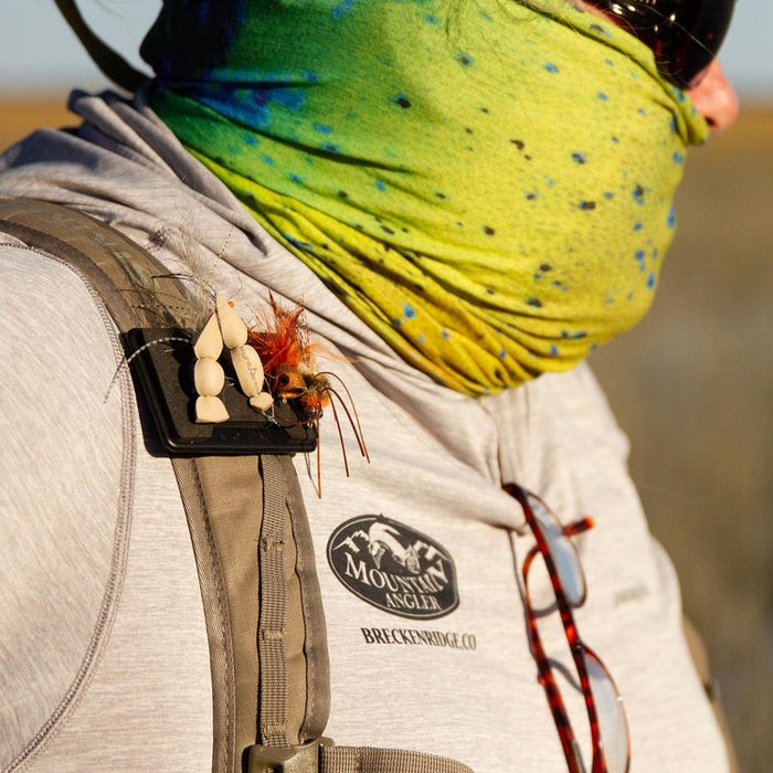 Atollas fly caddy worn on the strap of a fly fishing pack