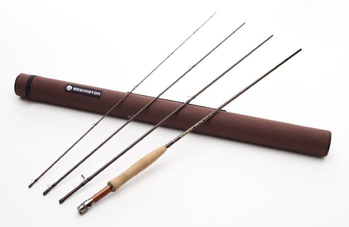 Redington fishing rod with brown tube case and multiple black rod sections