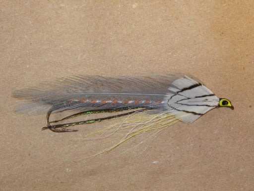 beautifully tied Gray Ghost streamer fishing fly from Rangeley Maine Fly Shop gray feather wing, silver pheasant cheek, orange and silver body