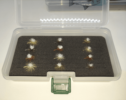 A fly box with foam insert and 12 Klinkhamer dry flies