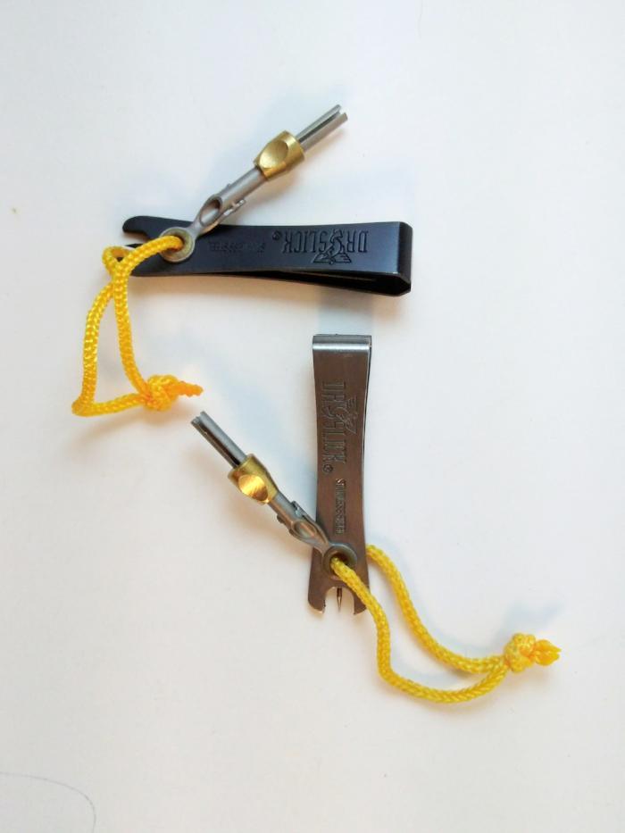 Black nippers with knot tying tool and yellow cord loop