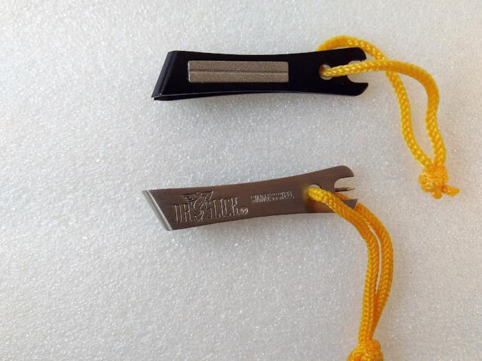 Dr. Slick nippers with metal cutting jaws and yellow braided cord