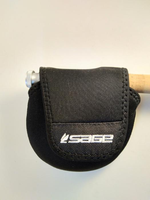 Sage neoprene reel case, dark gray with SAGE logo and stitched flap