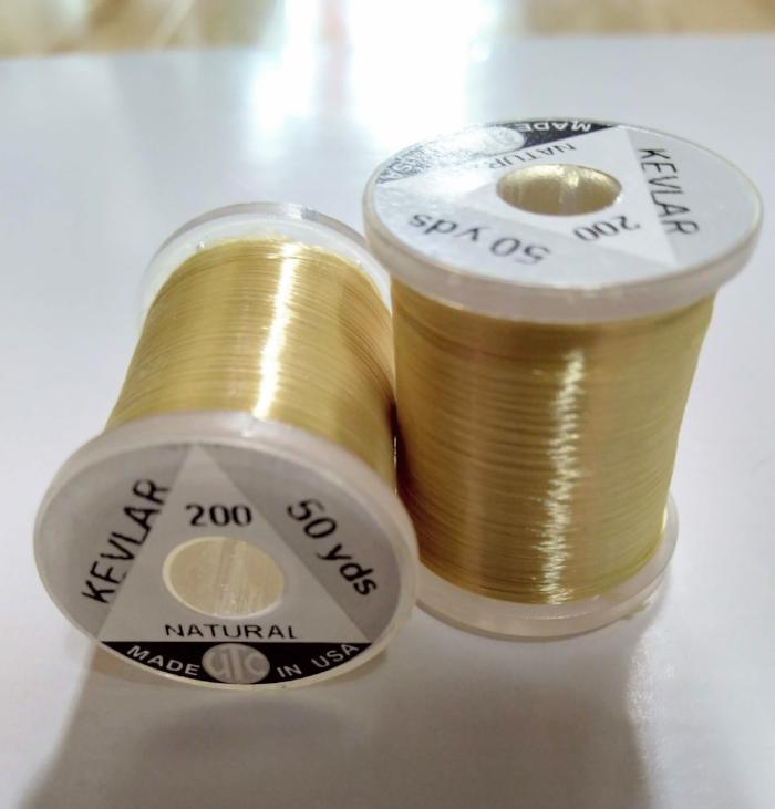 Kevlar thread spools, natural tan fiber in clear plastic reels