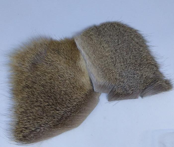 Brown deer fur patches, two pieces with tapered edges