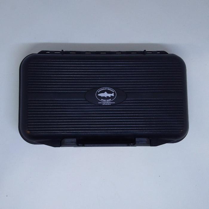 Dropper organizer case closed, ribbed dark exterior with oval logo badge