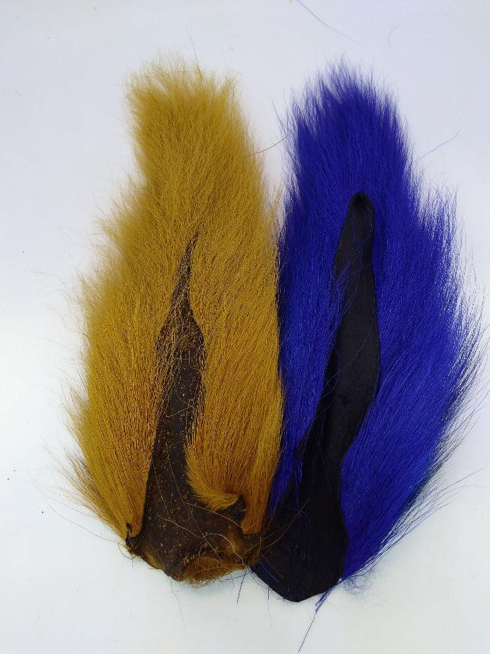 Bucktail feathers from Wapsi: yellow and blue with dark tips