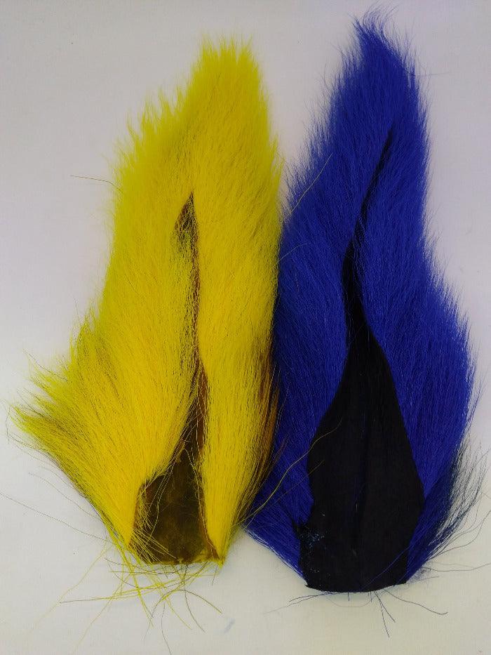 Bucktail feathers, yellow and blue with dark black tips and tapered shape