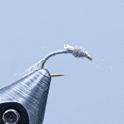 WD-50 fly fishing lure with gray dubbing head, dark olive hook, and pale tail fibers