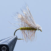 Deer hair caddis fly with light tan hair wing and green body band, curved hook