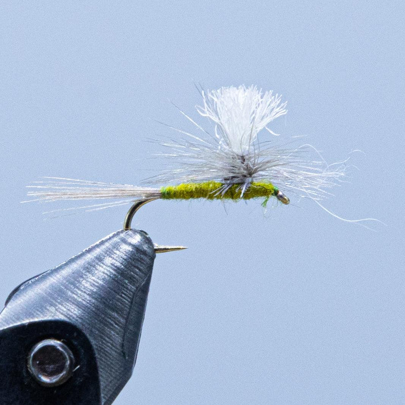 Parachute dry fly lure with dark body and upright white feather wing