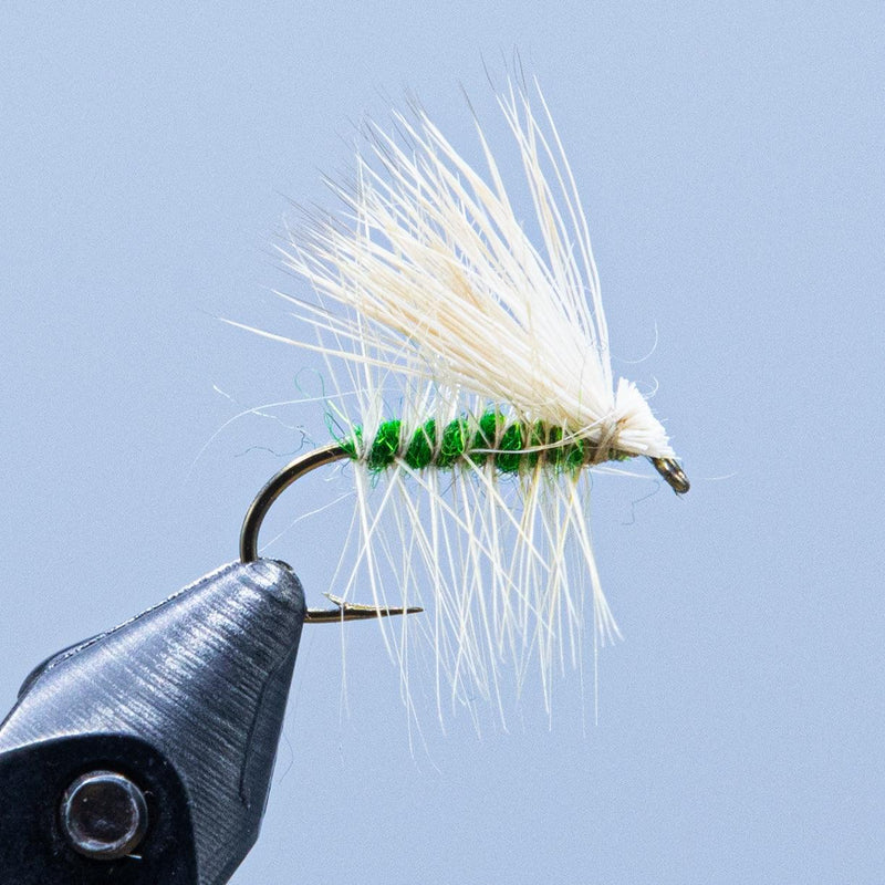Deer hair caddis fly with tan wing and green body band, curved hook