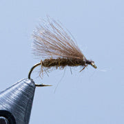 CDC caddis fly with tan brown feather tail and shiny dark hook