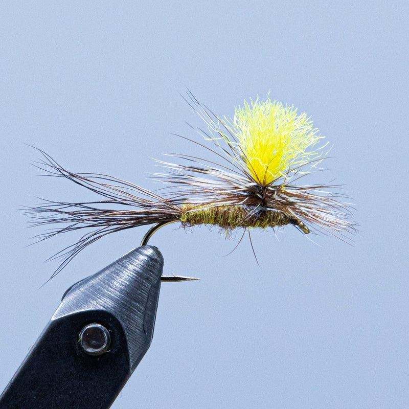 Parachute fly lure with yellow and gray foam wings