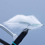 Double Bunny streamer fly lure with white fur and teal thread wraps
