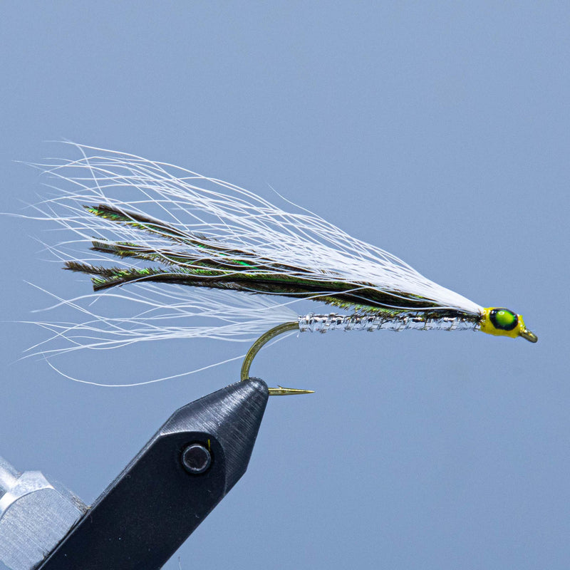 Fishing lure with green bead head and silver wing, tied on a hook