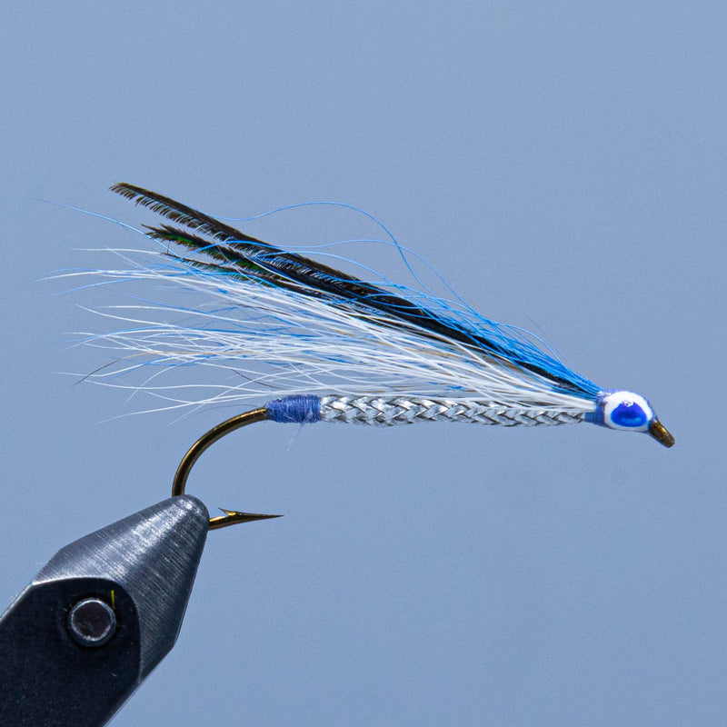 Blue bucktail fly lure with braided body and black head