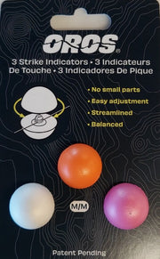 Blister pack showing three foam strike indicators: orange, white, and purple