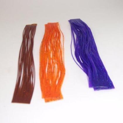 three colors of silicone material for tying legs on fishing flies