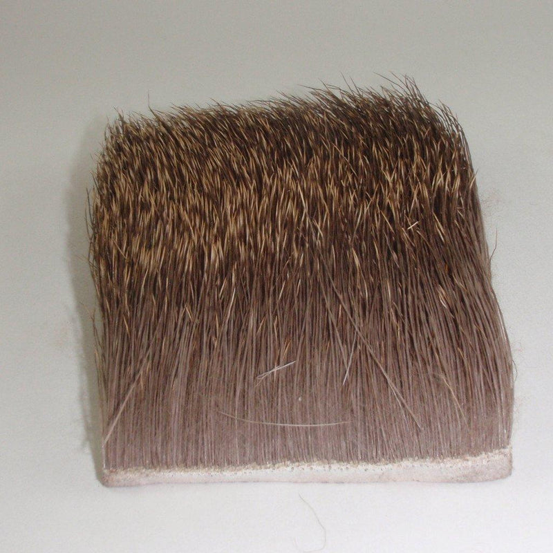 Elk body hair swatch, brown fibers