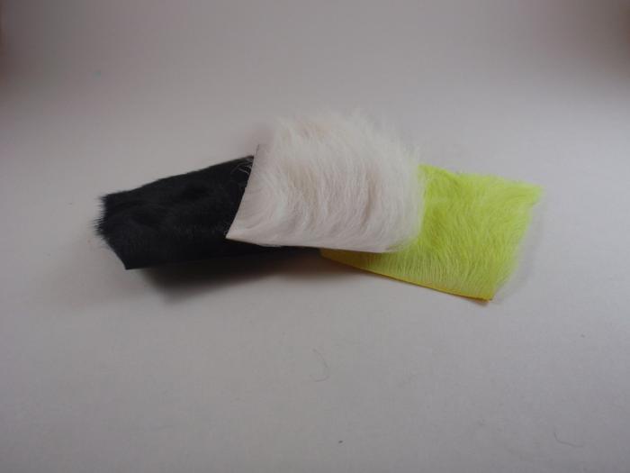 three pieces of calf body hair used for small size hair-winged Wulffs