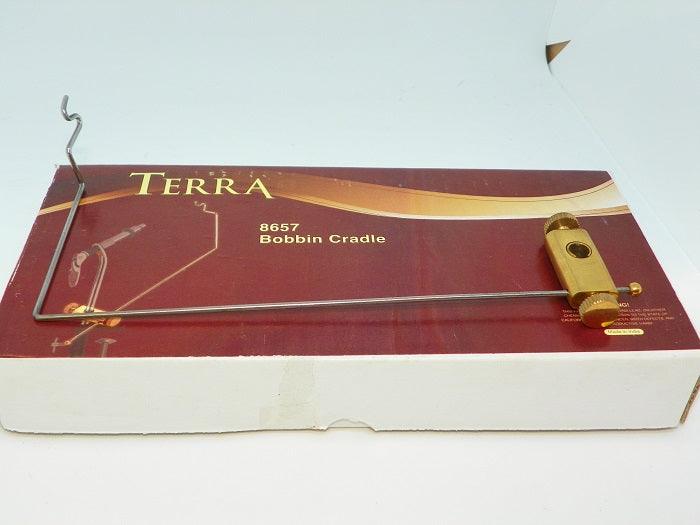 Terra bobbin cradle with metal frame, hooks, and brass-toned adjustment arm