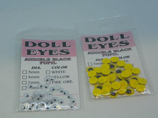 packages of doll eyes in yellow and white to be used in tying fishing flies
