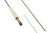 Fly fishing rod with cream cork handle, dark reel seat, and metal guides