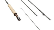 Fly rod with light cork handle, black reel seat, and metal guide eyes
