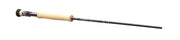 Fishing rod with cork handle and slim black blank with line guides, side view