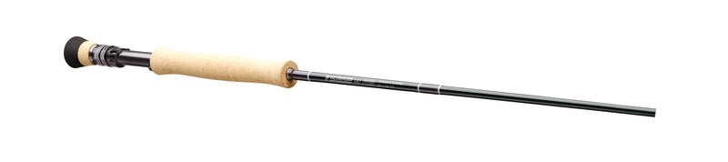 Fishing rod with cork handle and slim black blank with line guides, side view