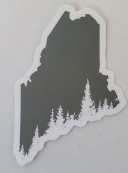 Reclaimed Maine outline sticker with evergreen trees and white border