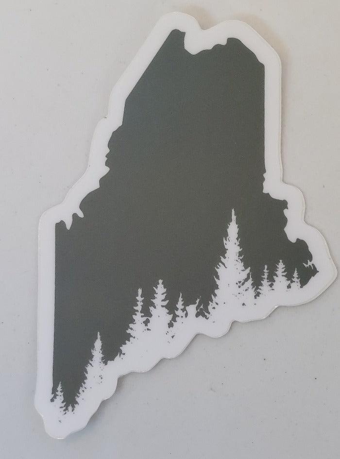 Reclaimed Maine outline sticker with evergreen trees and white border