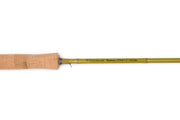 Fly fishing rod with cork handle and gold reel seat