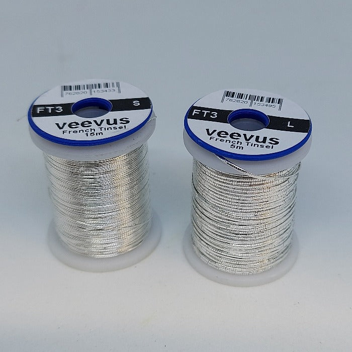 Veevus French Tinsel silver metallic thread spool, coiled on plastic reel