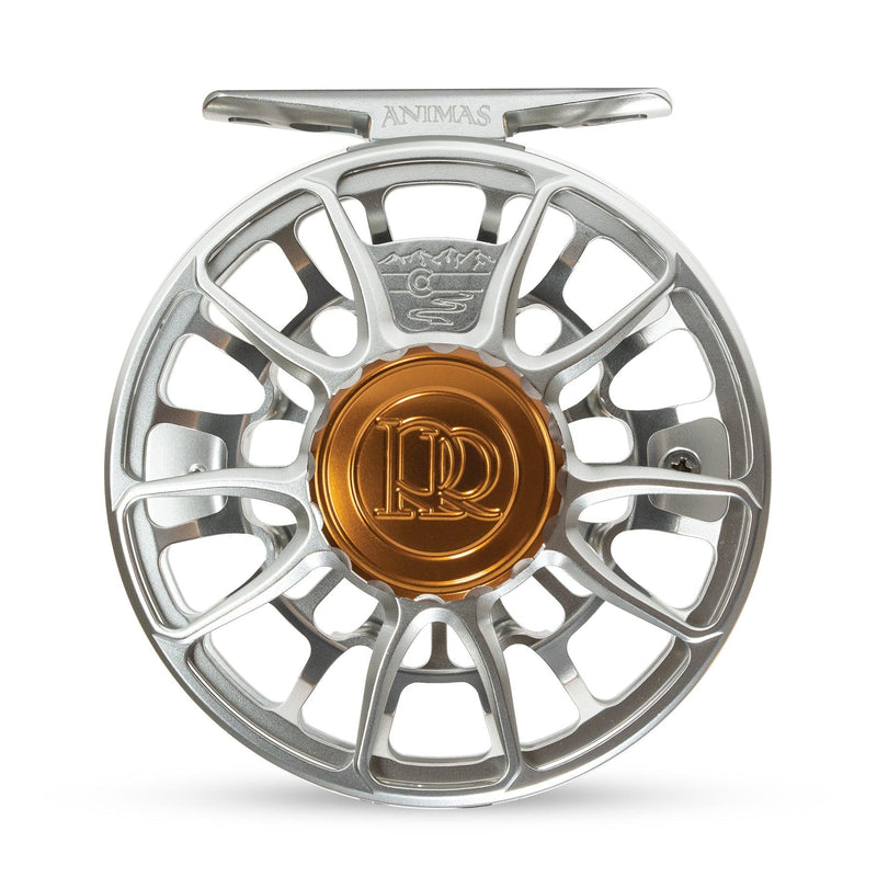Fishing reel with silver spoked rim and gold center logo