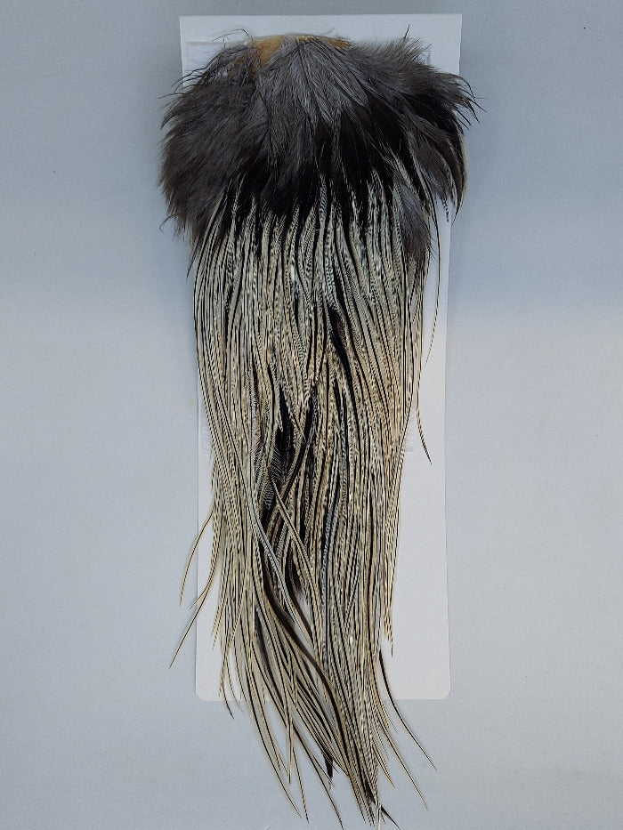 Badger saddle patch with dark top and long silver-gray fringe