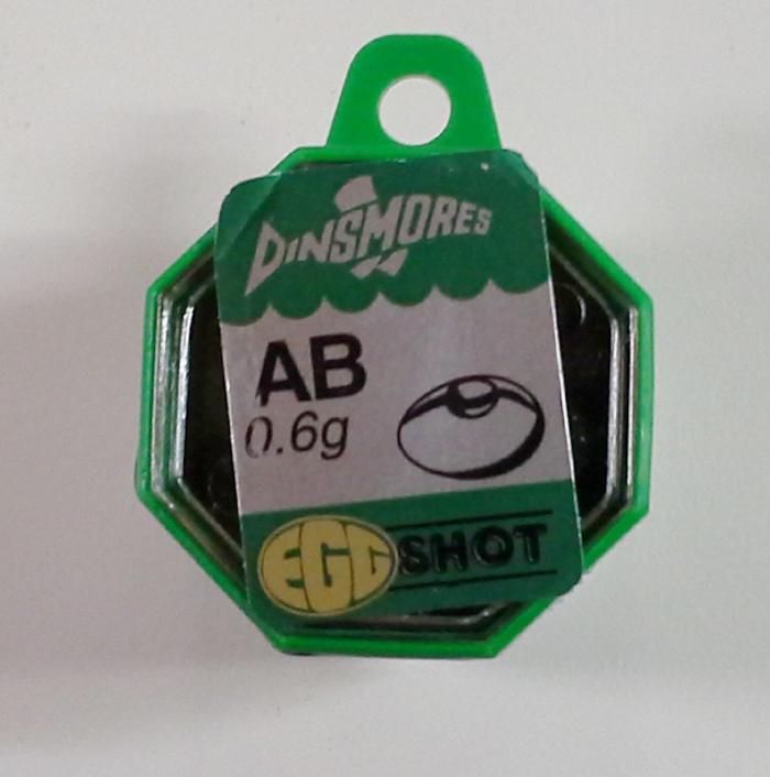 Green Dinsmore split shot dispenser with label AB 0.6g and round icon