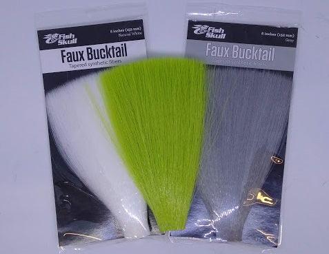packages of gray and white faux bucktail with a chartreuse faux bucktail on top.  Used for tying flies and from a Rangeley Maine fly shop