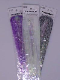 purple, silver, and pearl packages of flashabou used for tying fly fishing flies